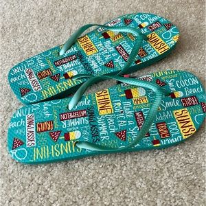 NWT Women’s size XL (11-12) flip flops